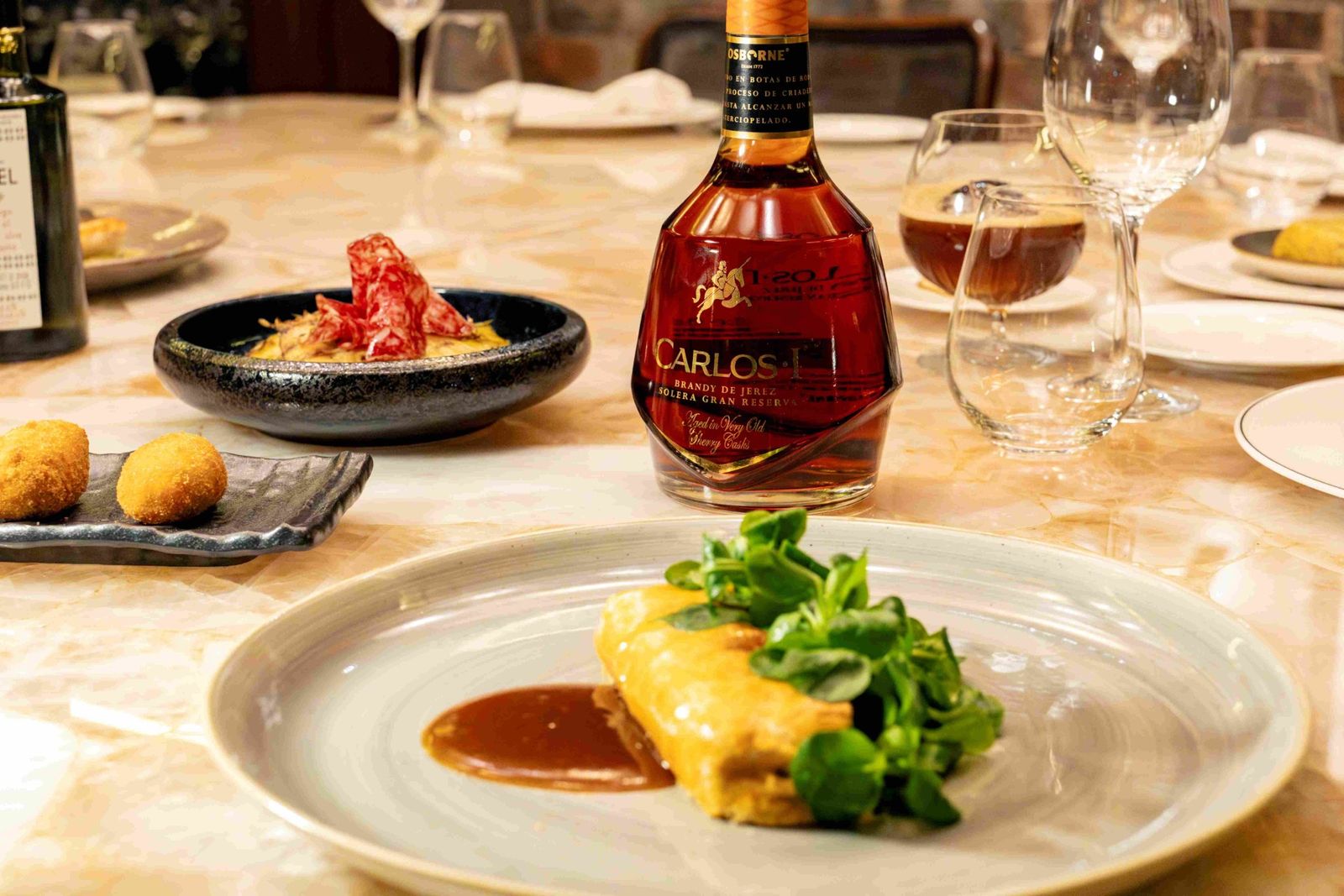 Platos de Tatel Madrid con Carlos I