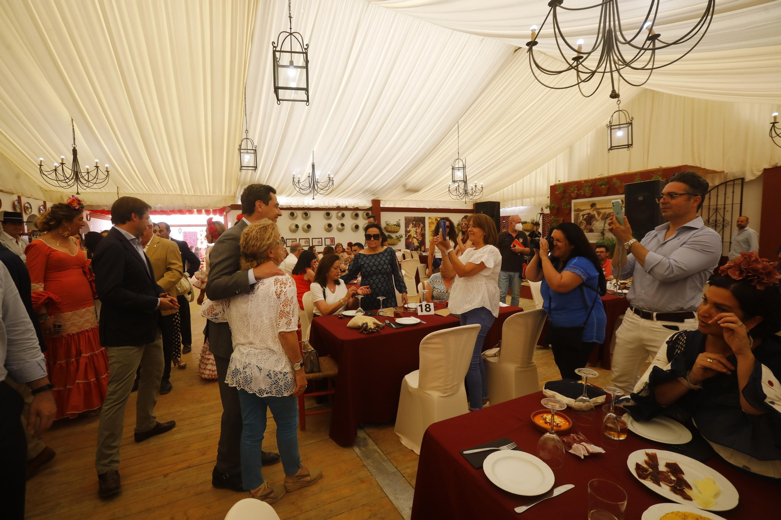 La visita de Juanma Moreno a la Feria de Córdoba, en imágenes