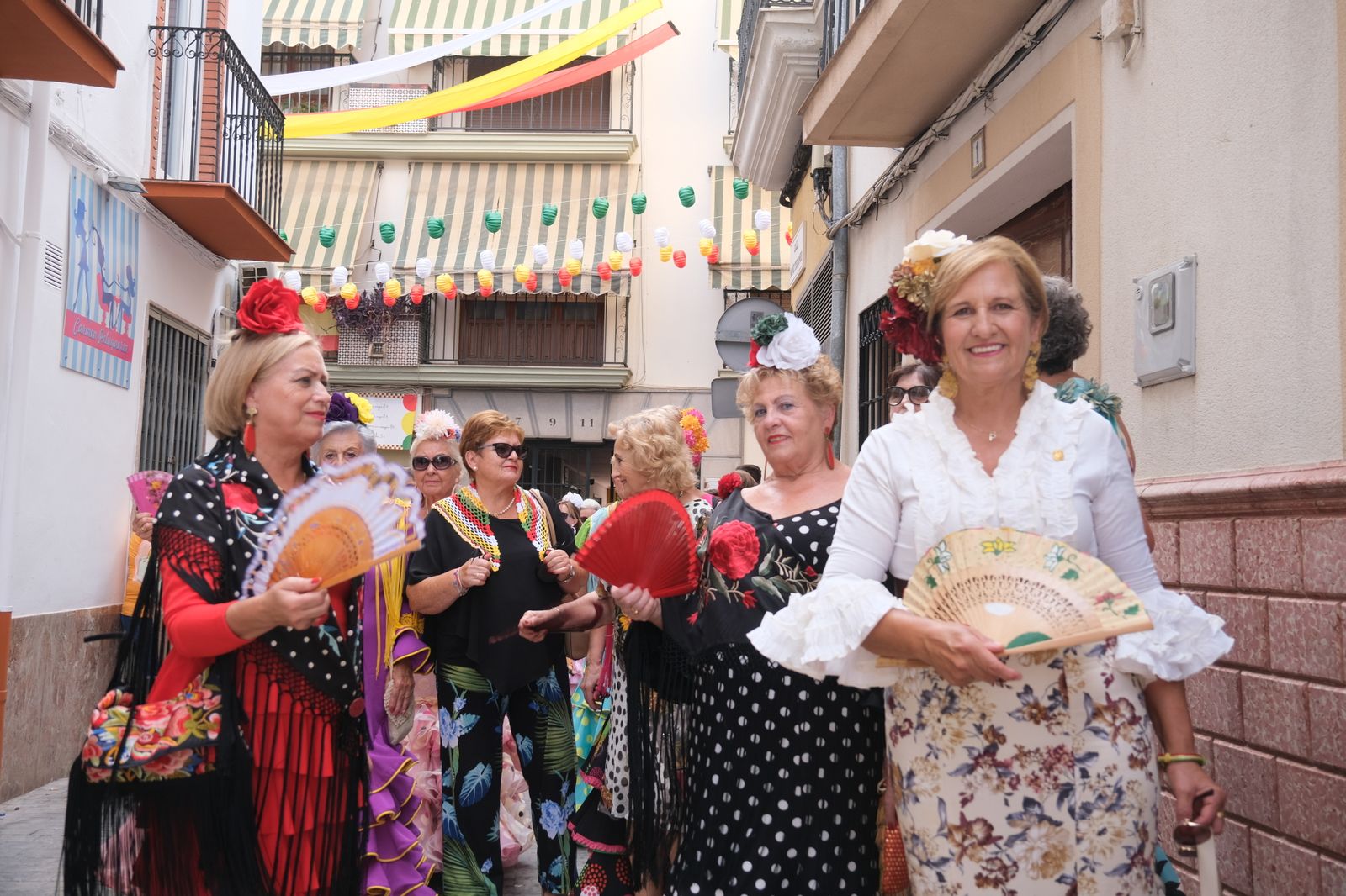 La celebración en Cabra del Día de la Mujer con motivo de la Real Feria, en imágenes