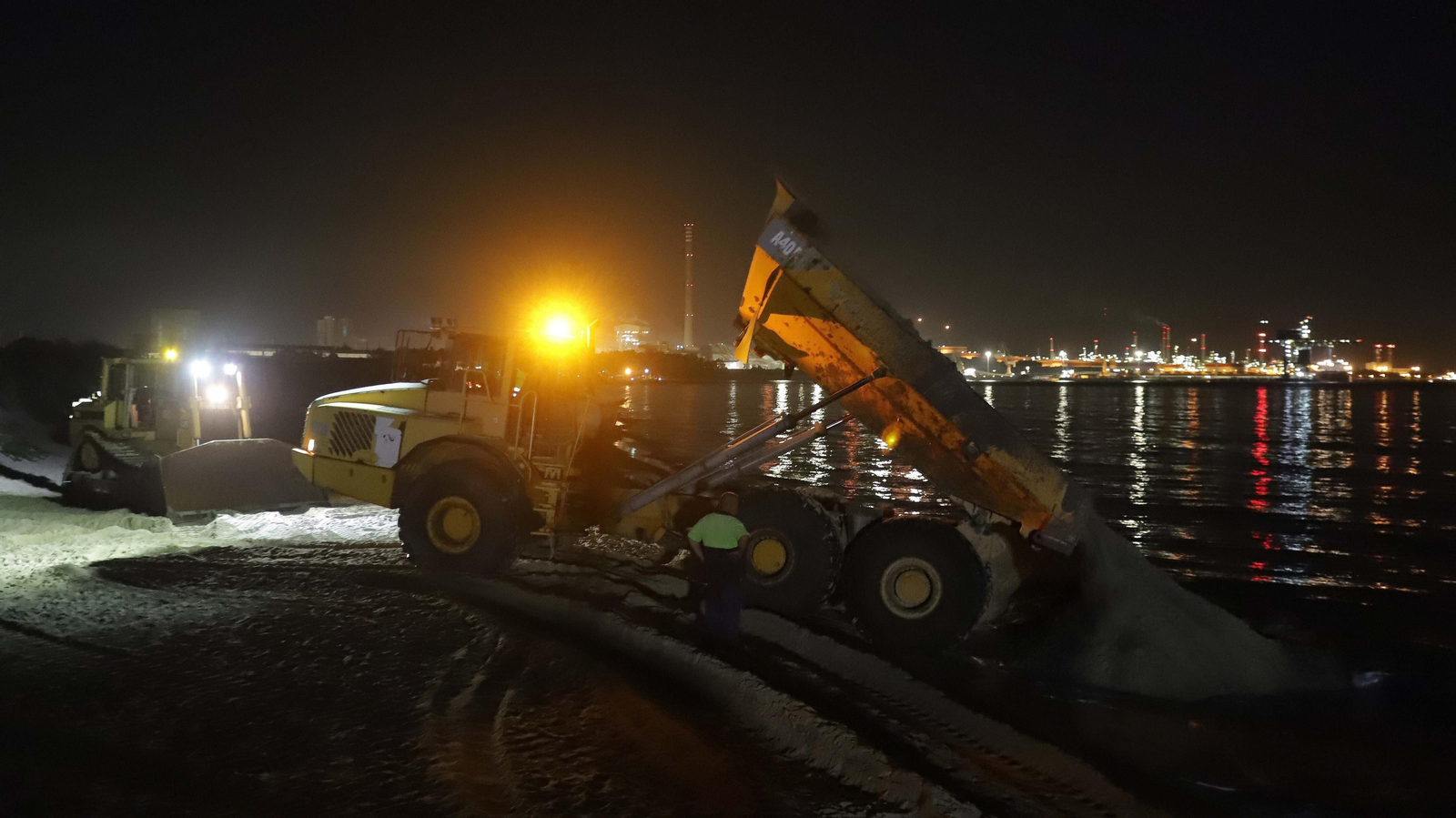 Fotos del trasvase de arena en El Rinconcillo