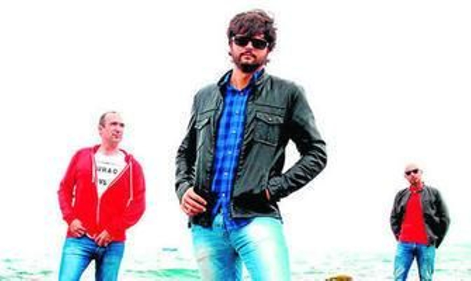 El trío de Buenas Noticias, con el cantante Alfredo Ramiro en el centro.