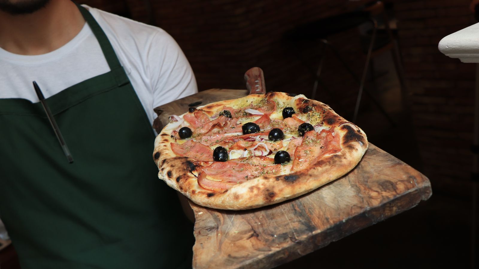 Pizza al horno de leña de Torres y García.