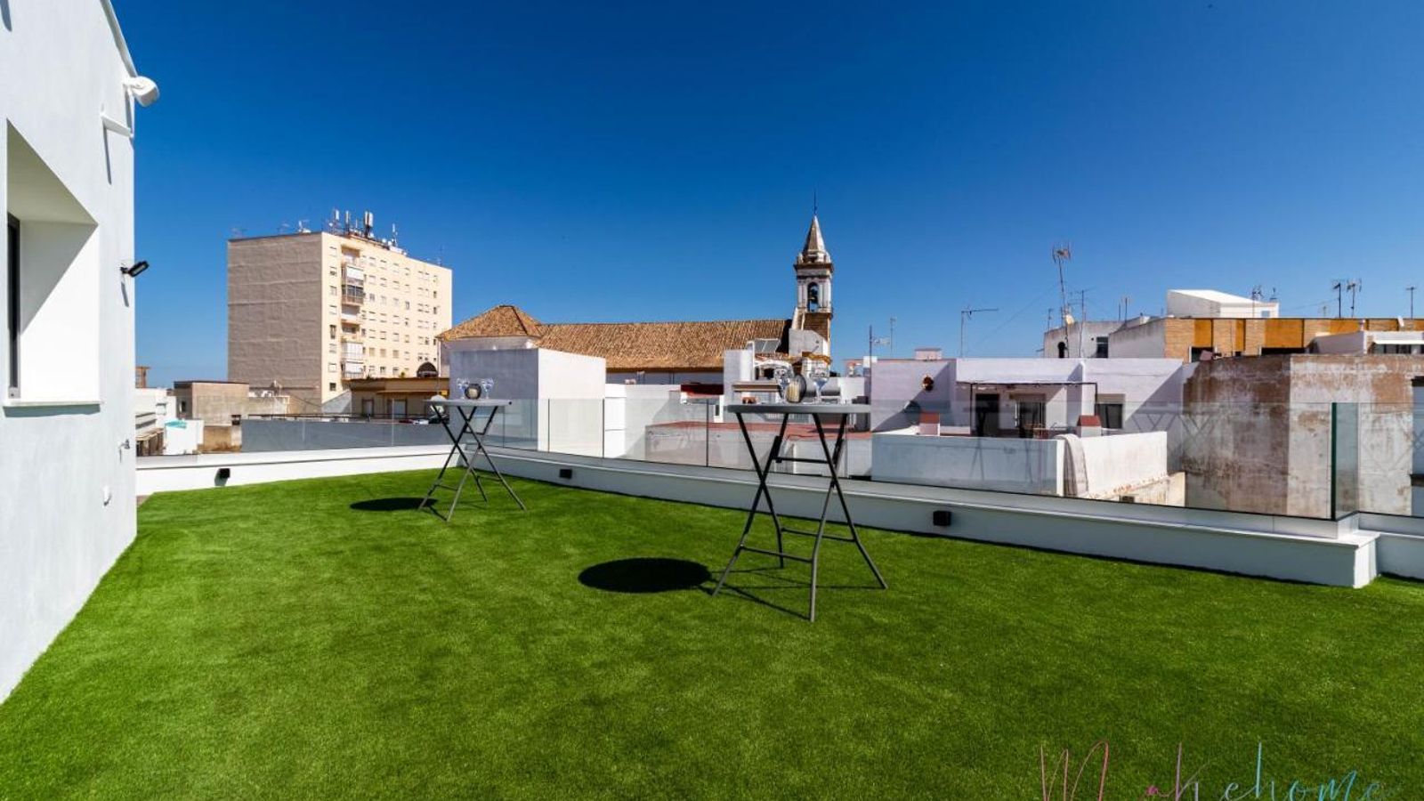 Terraza de los Luxury Apartamentos Doña Bella