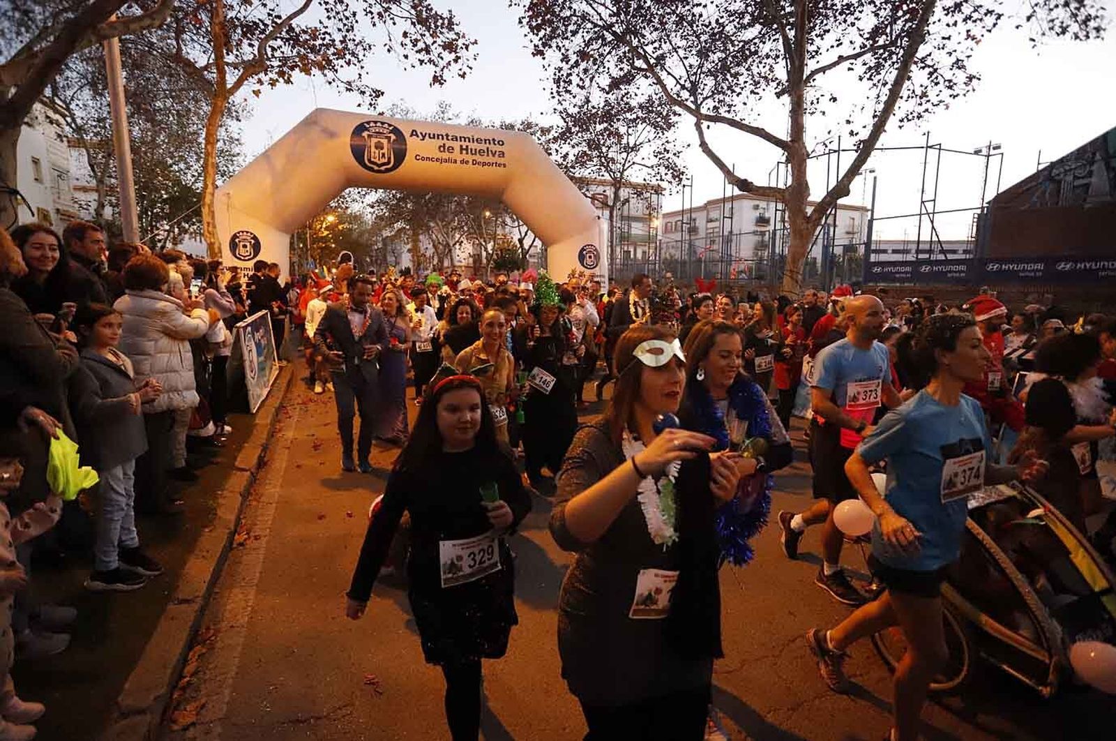 Imágenes de la carrera de San Silvestre en Huelva