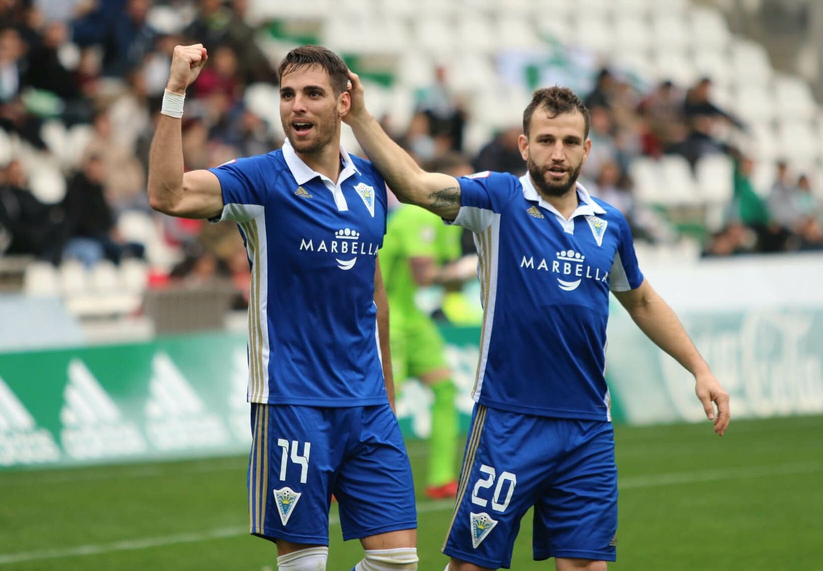Manel y Óscar celebran un gol ante el Córdoba.