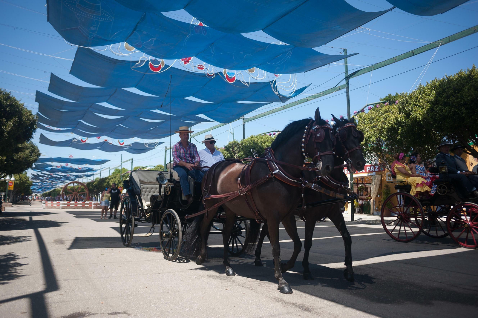 Segundo día de Feria de Málaga en el Centro y en el Real, en fotos