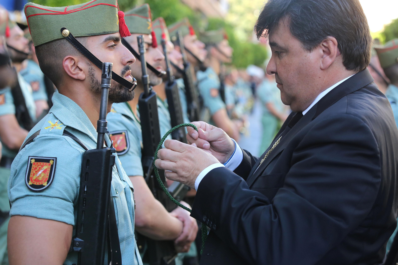 Procesión del Cristo de la Vera Cruz, escoltado por la Legión en las calles de Huelva