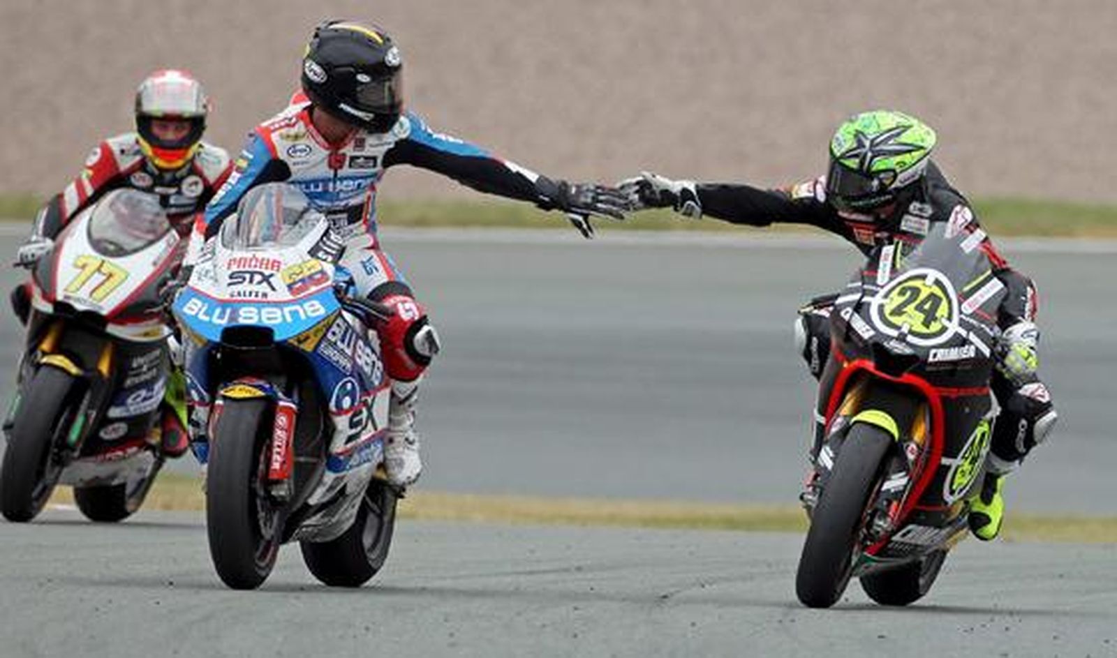 Pedrosa, Elías y Márquez firman una nueva jornada memorable para el motociclismo español. / Reportaje gráfico: EFE, Reuters, AFP.