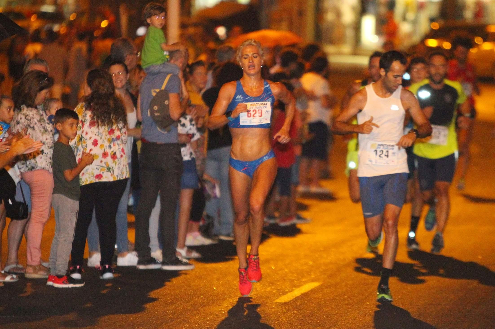 La VII Carrera Nocturna de Huelva en imágenes