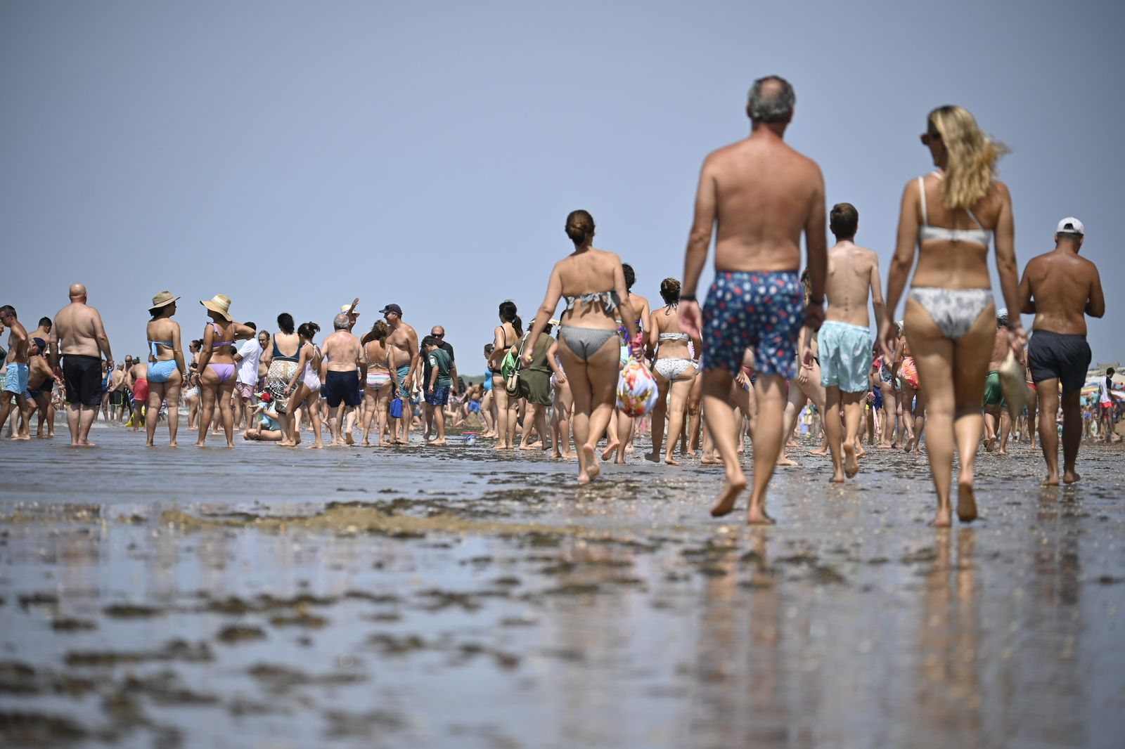 Ambiente en la playas de Huelva este sábado 22 de julio, en imágenes