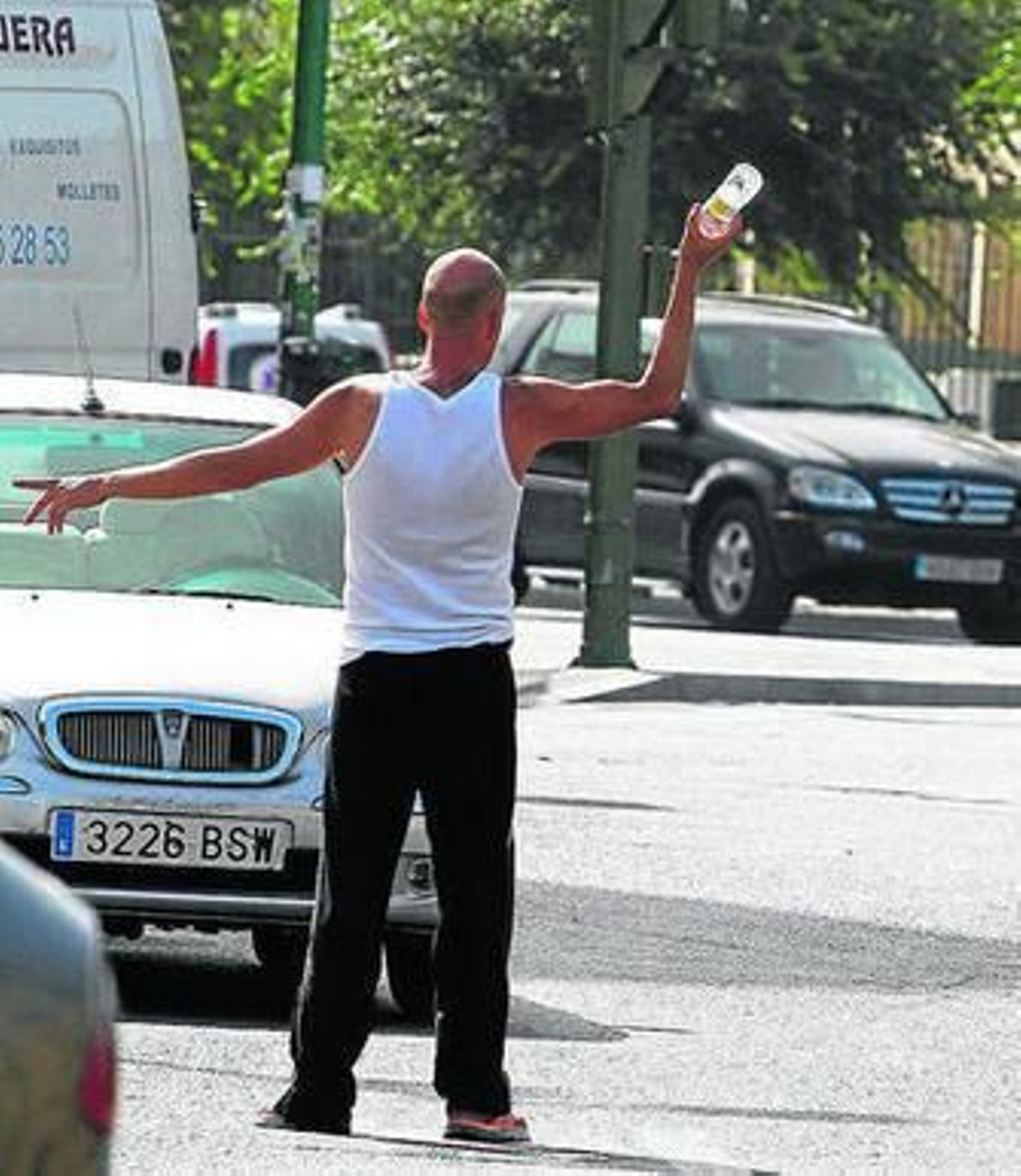 Imagen de archivo de un gorrillo aparcando.