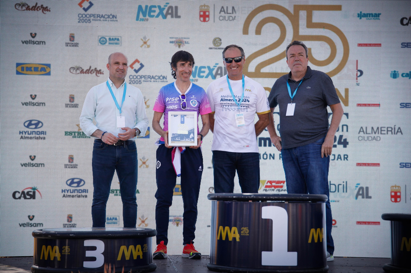 Imágenes de los premiados en la Media maratón de la Cuidad de Almería