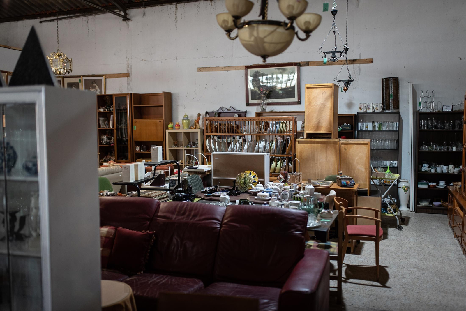 Una visita a la tienda de Traperos de Emaús en imágenes