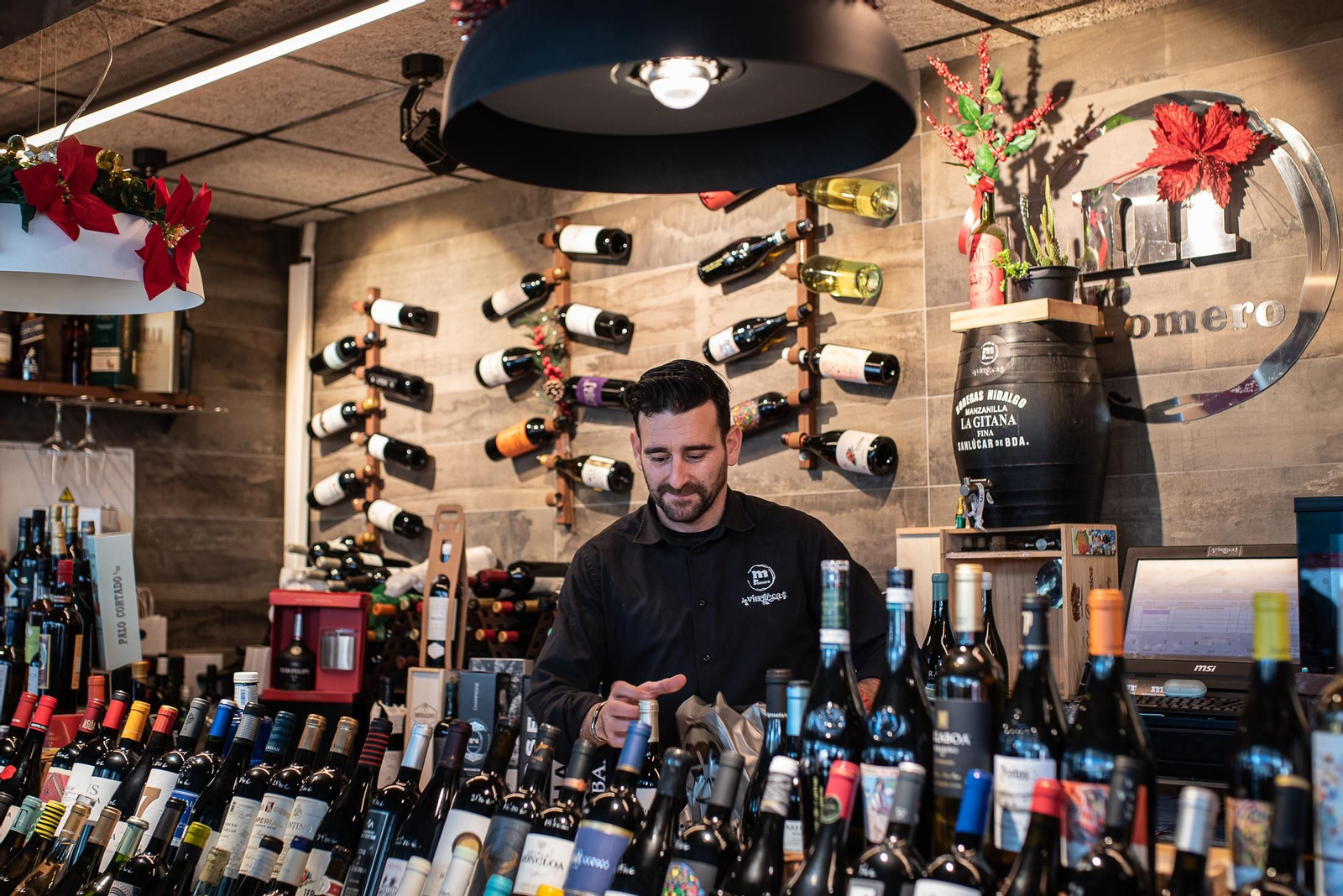 Las últimas compras en el Mercado del Carmen antes de Navidad, en imágenes