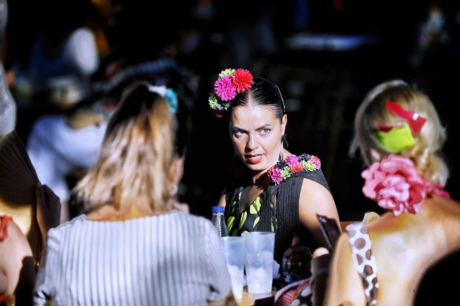 Búscate en las imágenes del Día de la Mujer de la Feria del Carmen de San Fernando
