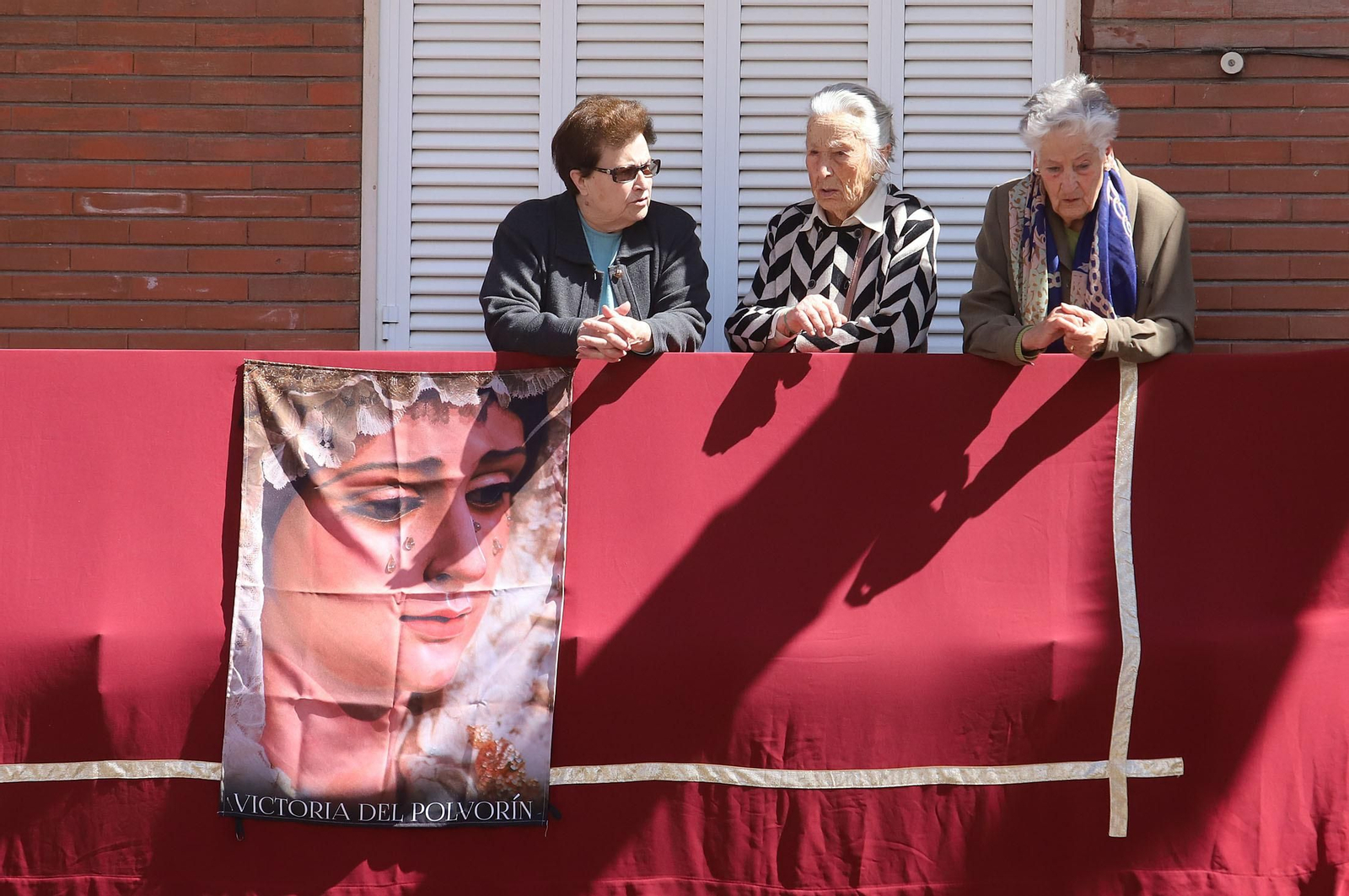 Imágenes de La Victoria en su salida procesional y su recorrido por el Barrio Obrero