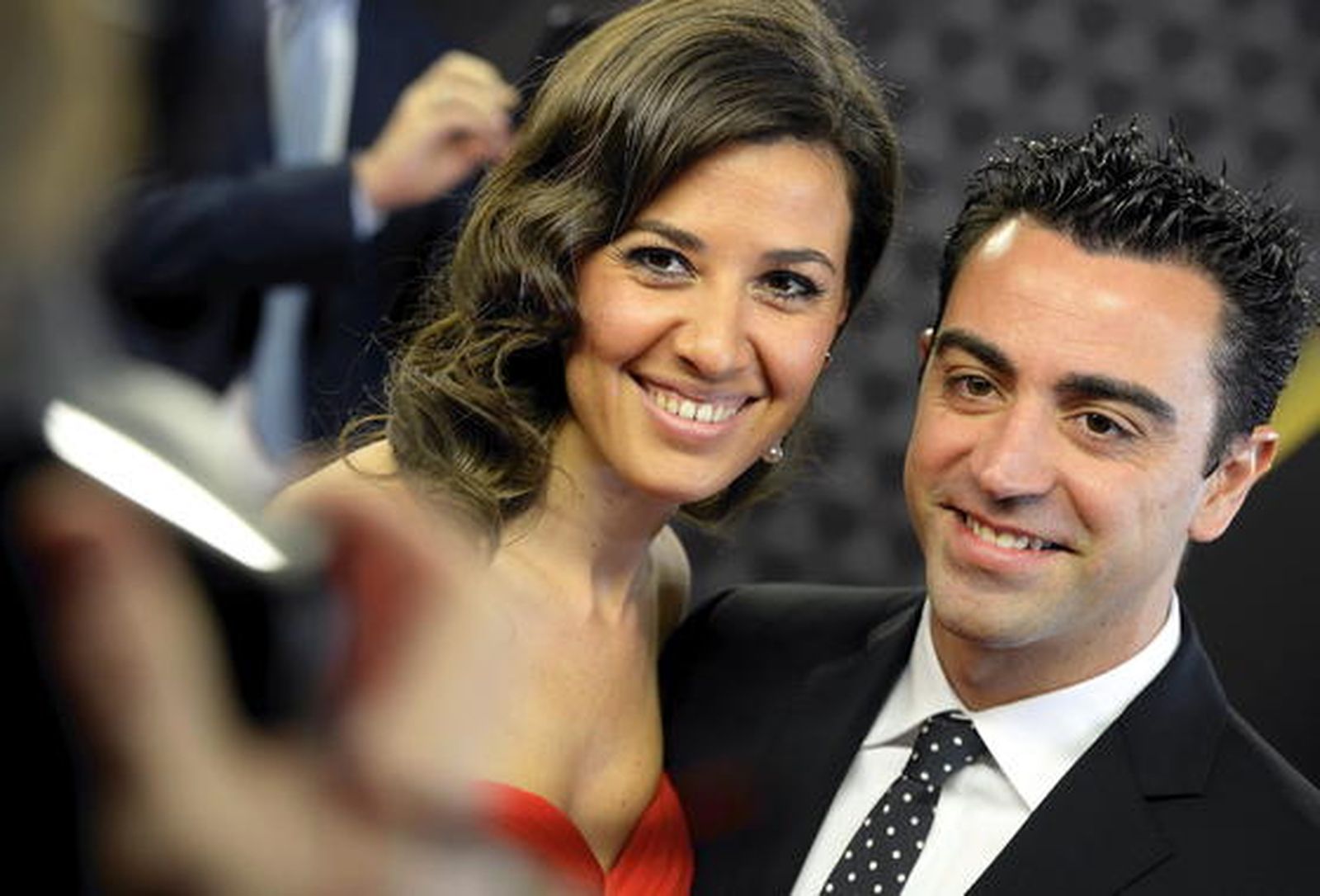 Xavi Hernández y su mujer Nuria

Foto: EFE