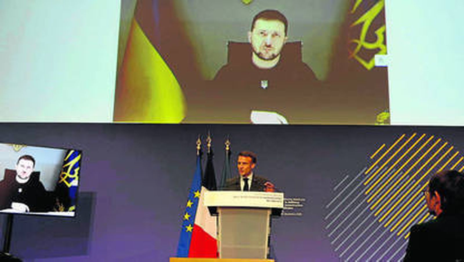 Emmanuel Macron y Volodimir Zelenski participan en una conferencia sobre la reconstrucción de Ucrania.