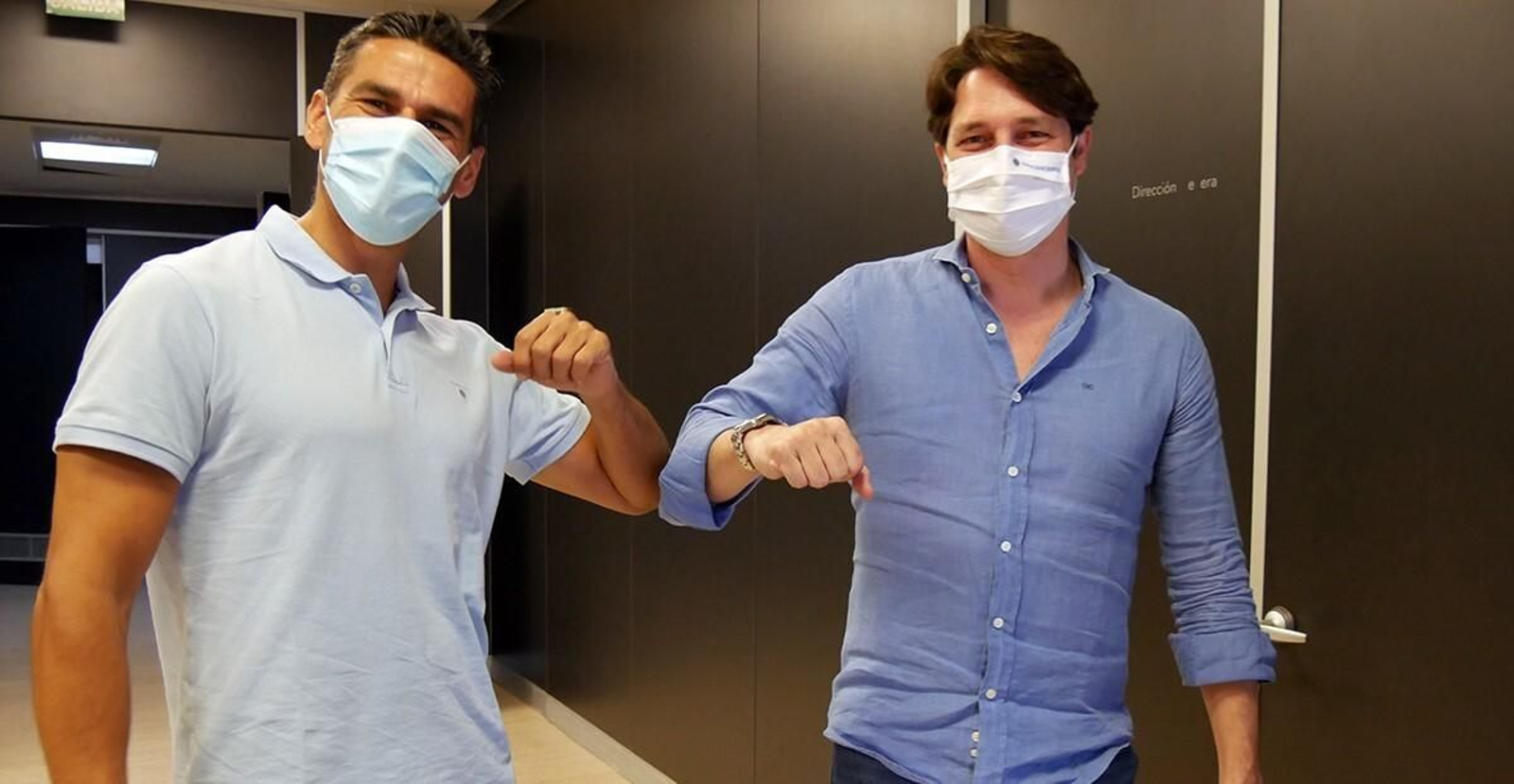 El director deportivo del Córdoba CF, Juanito, junto al consejero Adrián Fernández.