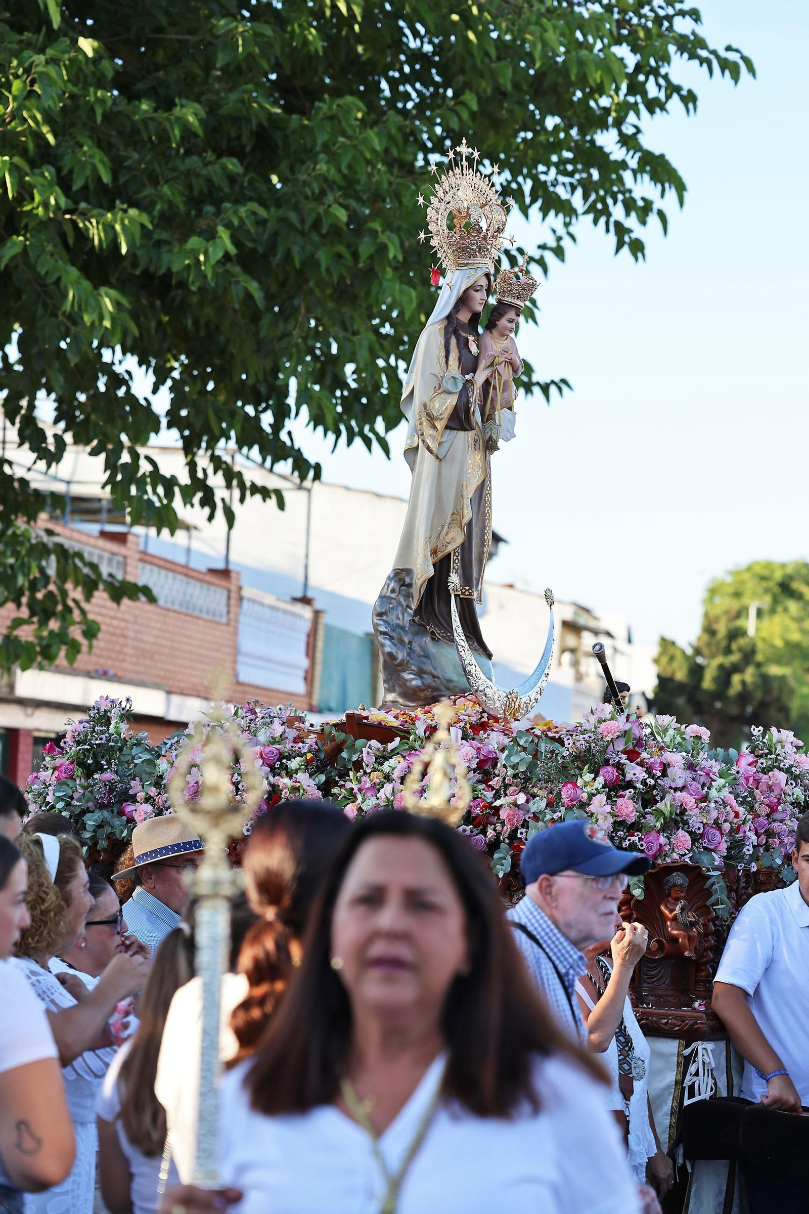 Imágenes de la Virgen del Carmen procesionando en Punta Umbría
