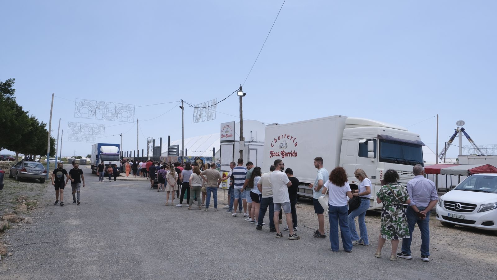 Imágenes de la degustación de huevos fritos con chorizo, en las Fiestas de Santa María del Águila