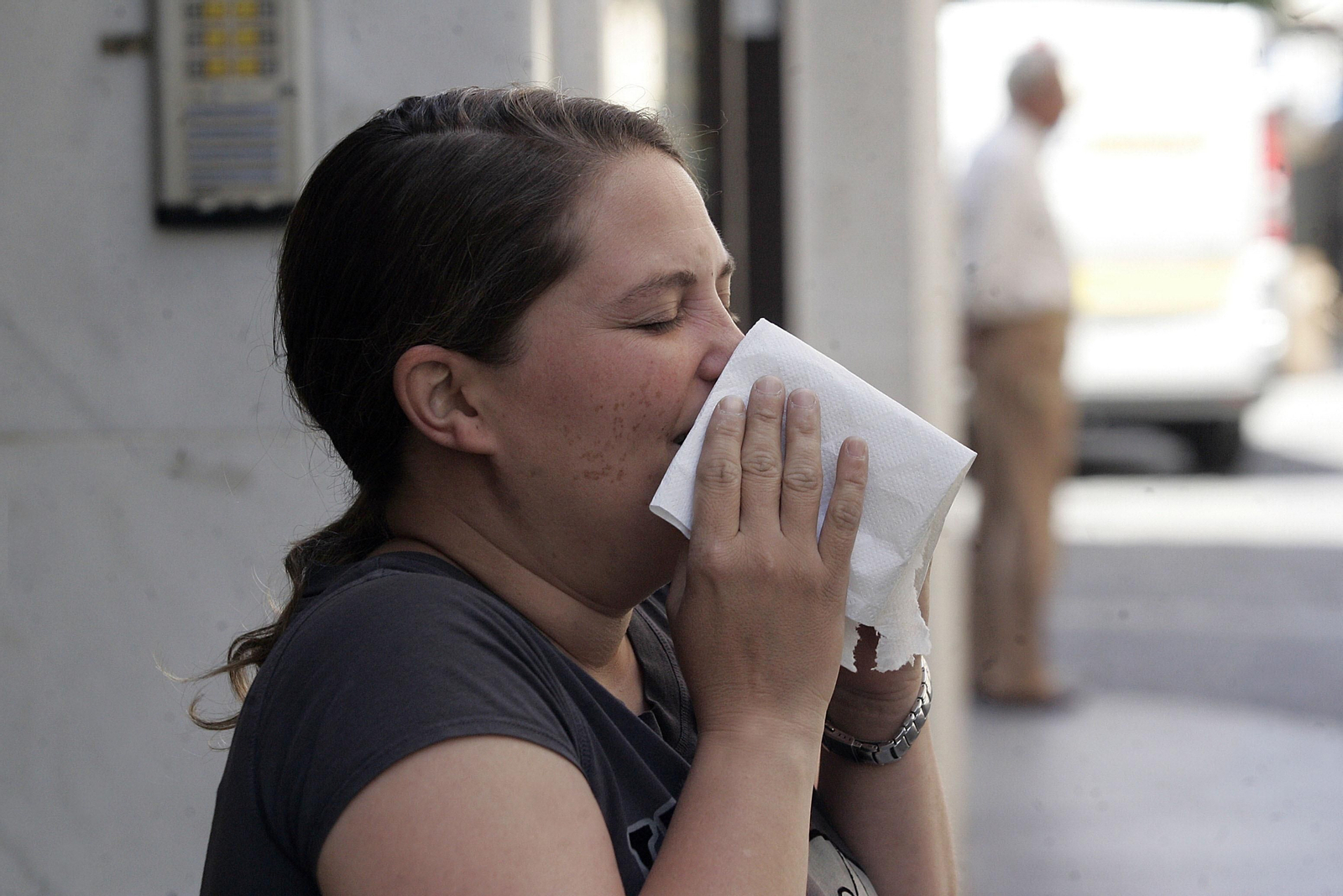 Una mujer con alergia.