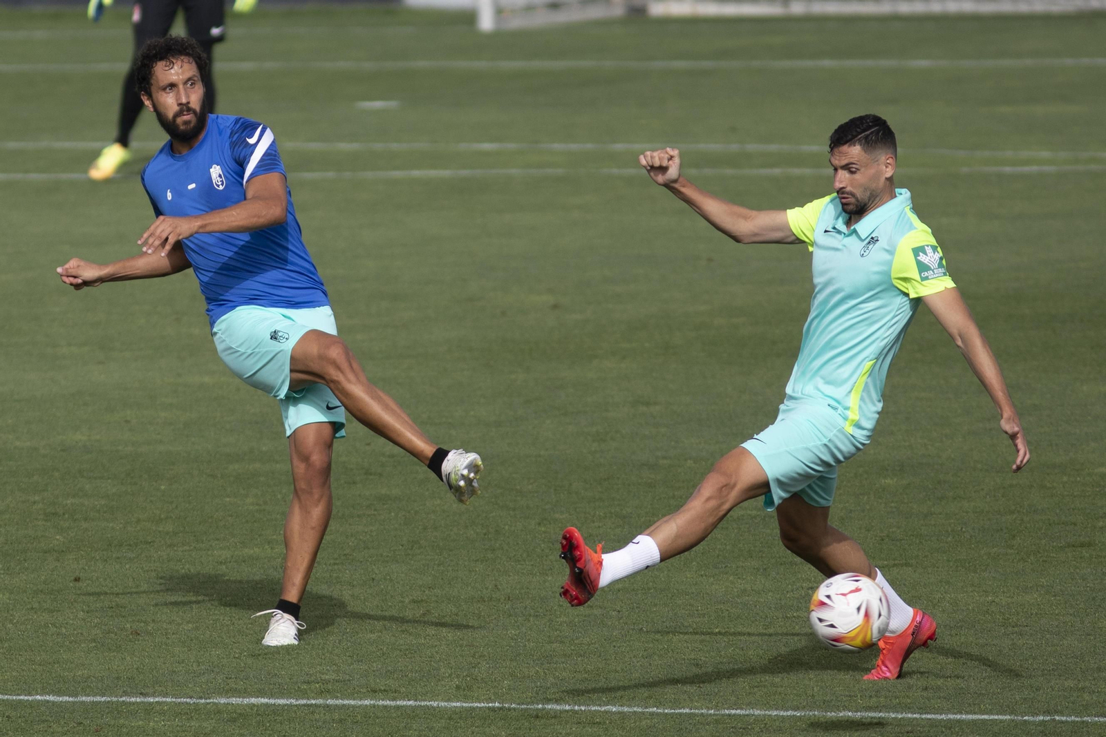 Germán y Antonio Puertas, en un entreno del Granada