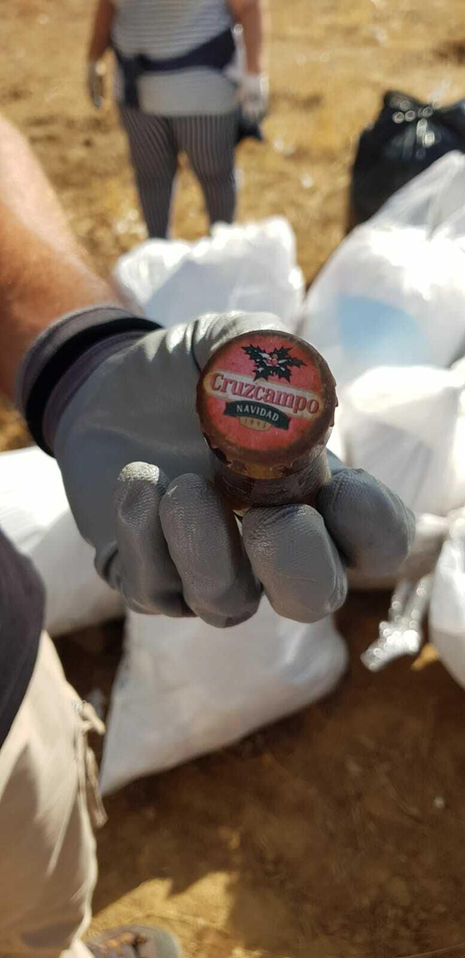 Una chapa de un botellín de Cruzcampo del año 1995.