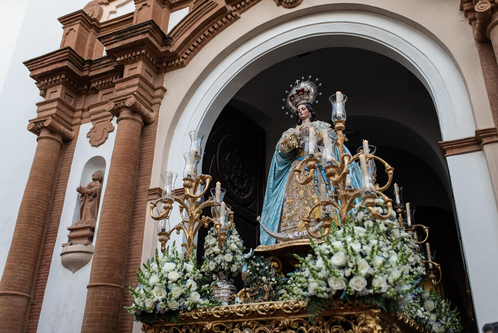 Imágenes de la Inmaculada Concepción procesionando por las calles de Huelva