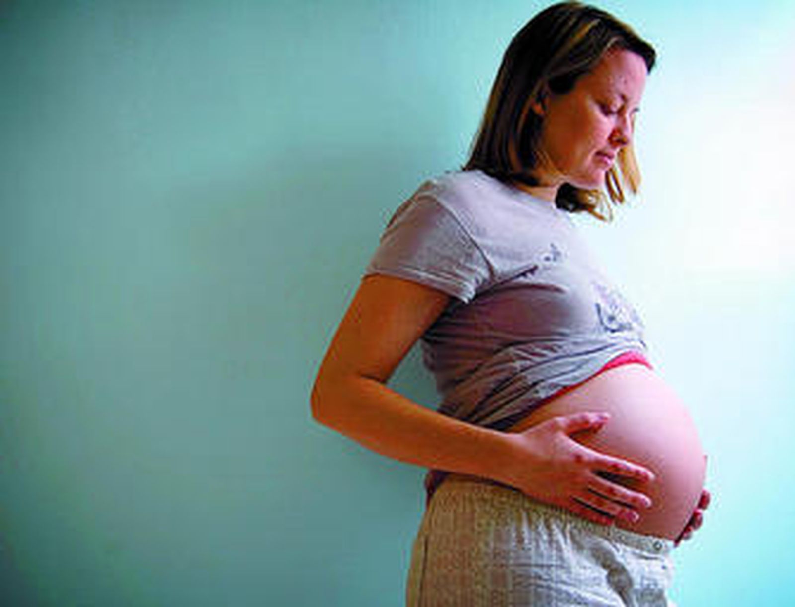 Una mujer en avanzado estado de gestación.