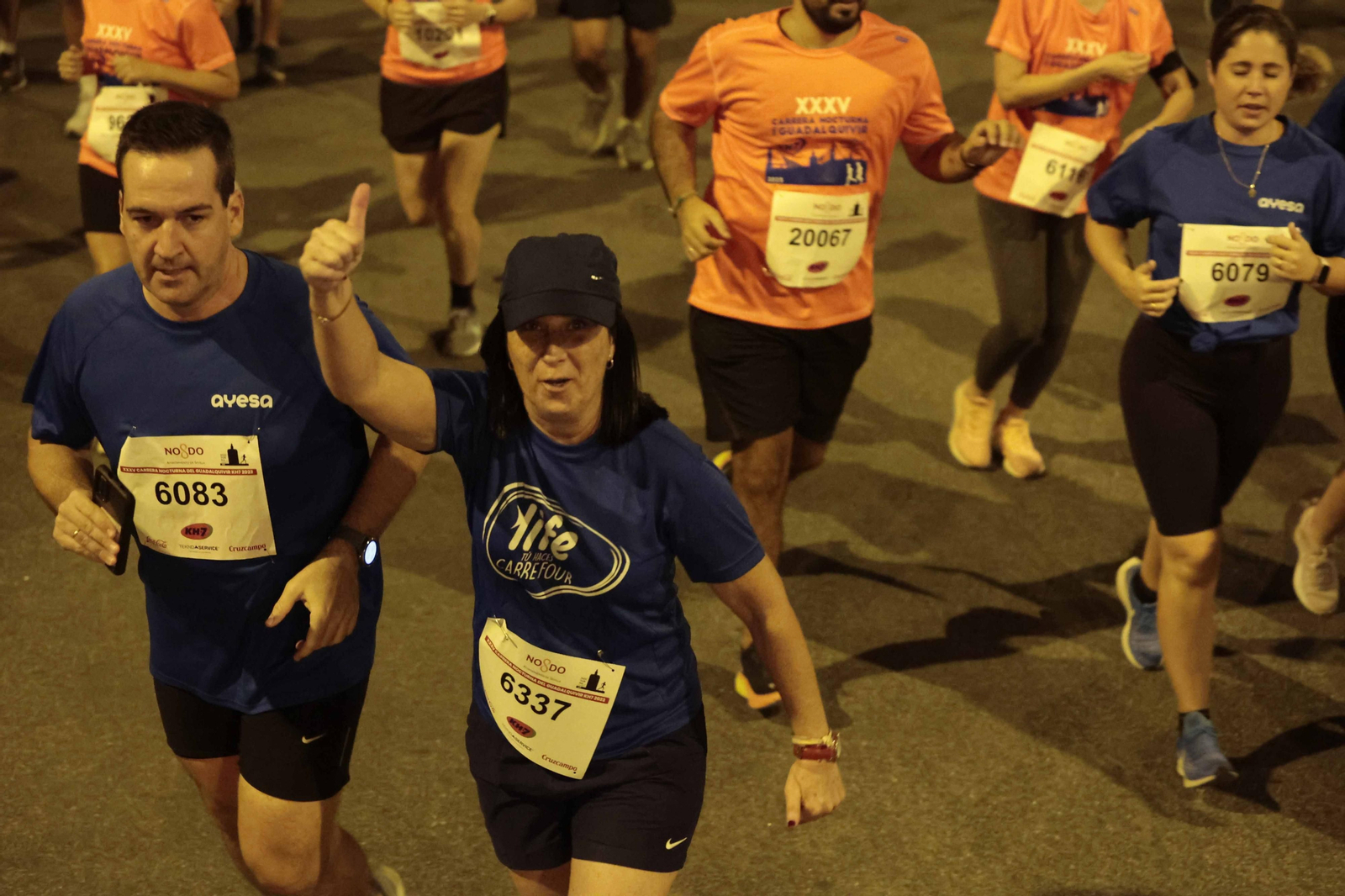 Búscate en las fotos de la Carrera Nocturna (III)