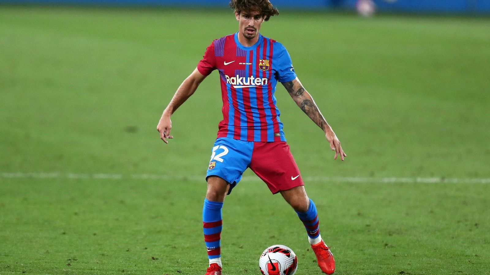 Álex Collado, en un encuentro en su etapa como futbolista del Barcelona.