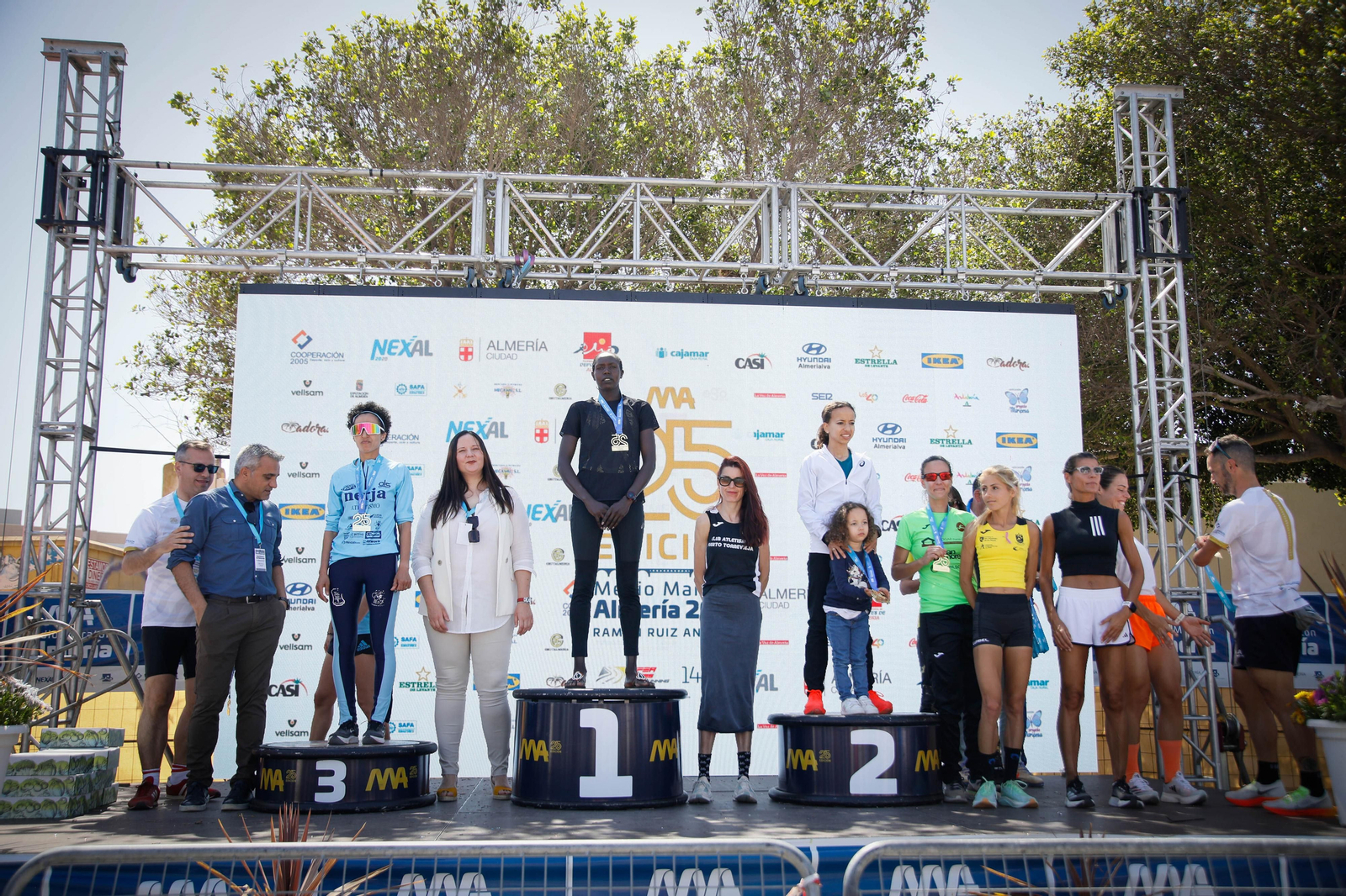 Imágenes de los premiados en la Media maratón de la Cuidad de Almería