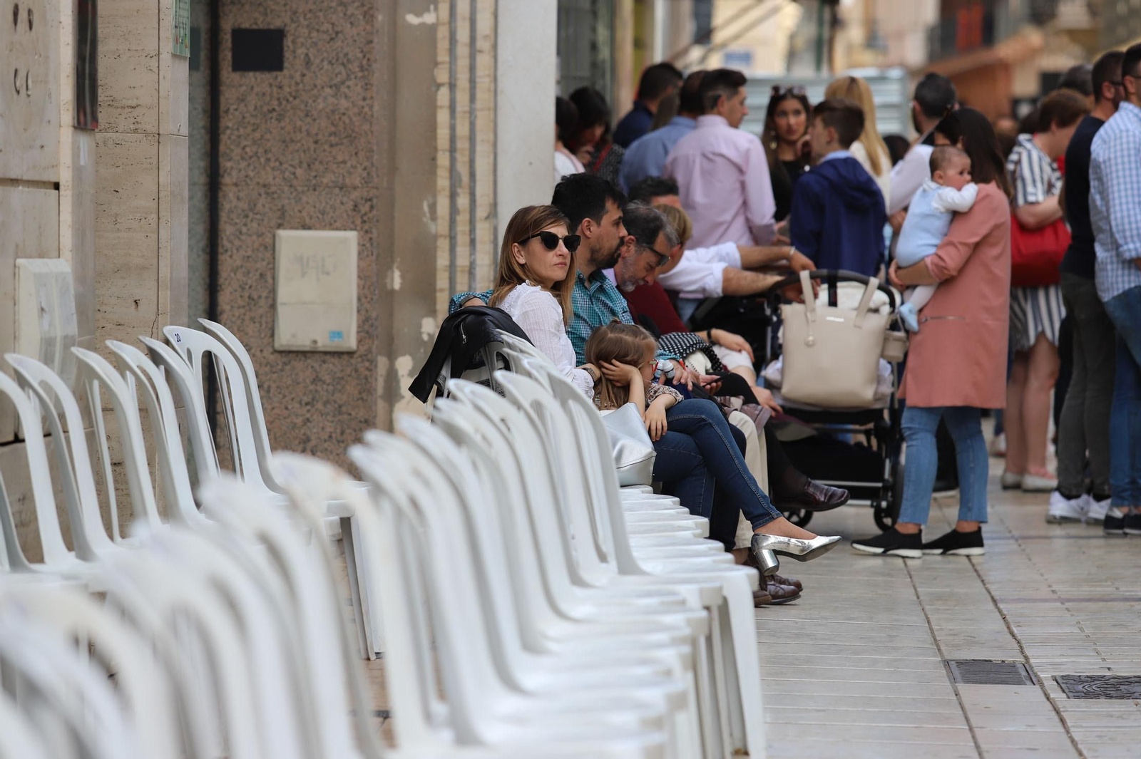 Imágenes del recorrido de la Borriquita  por las calles de Huelva