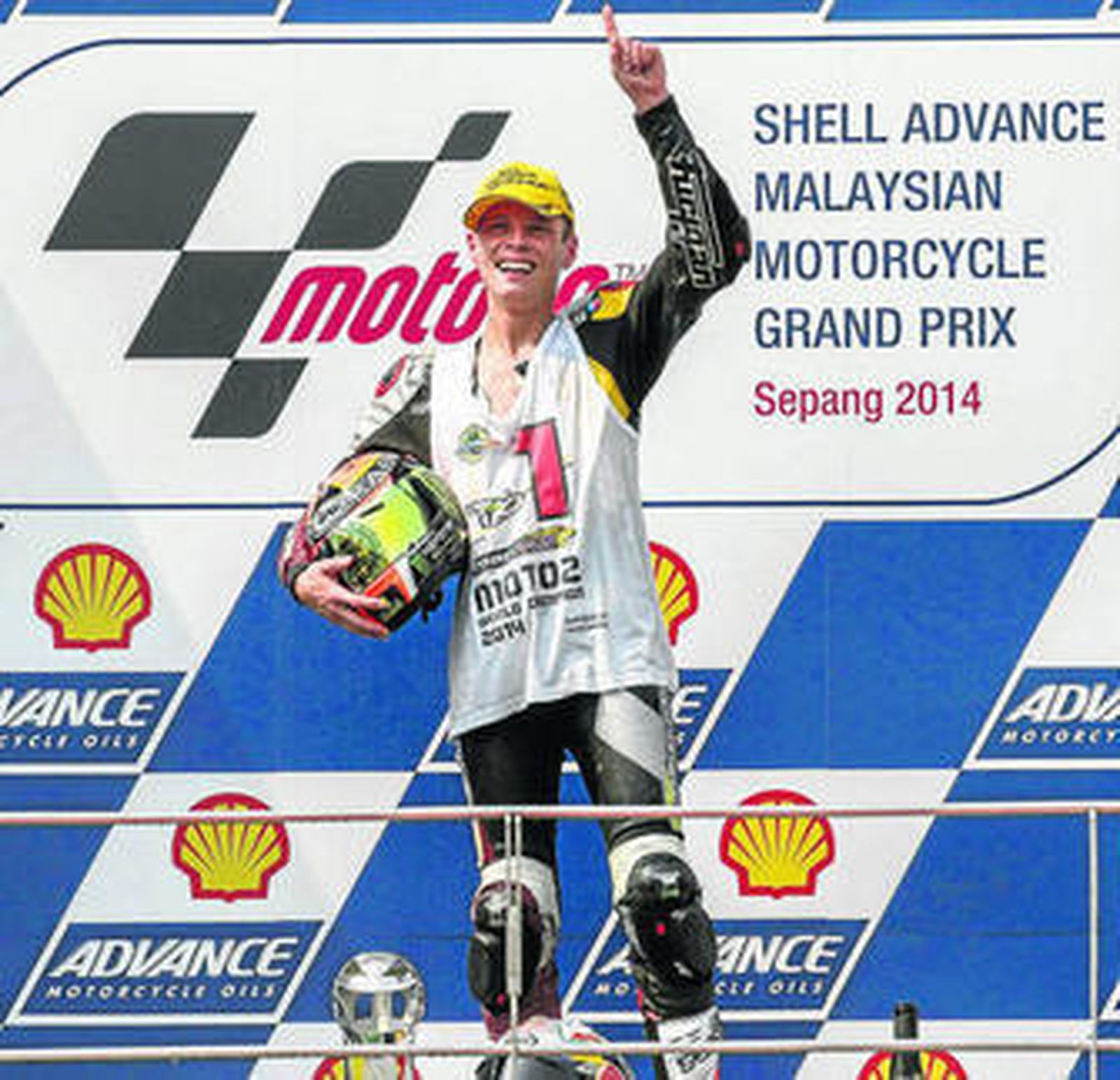 Tito Rabat alza el dedo índice en el GP de Malasia, donde le bastó con un tercer puesto para proclamarse campeón.