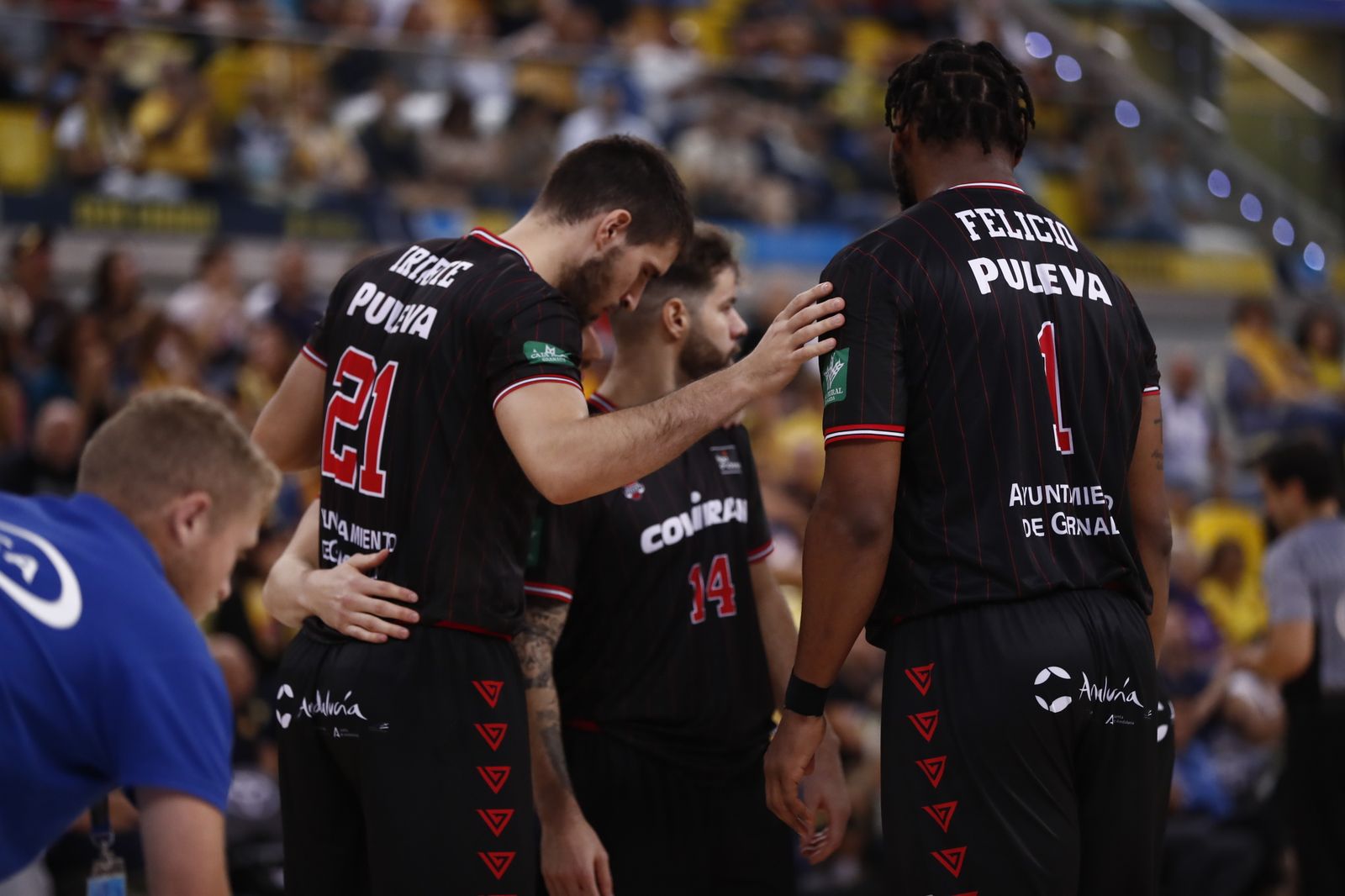 Iriarte, Christian Díaz y Cristiano Felicio en el partido en Gran Canaria de la primera vuelta.