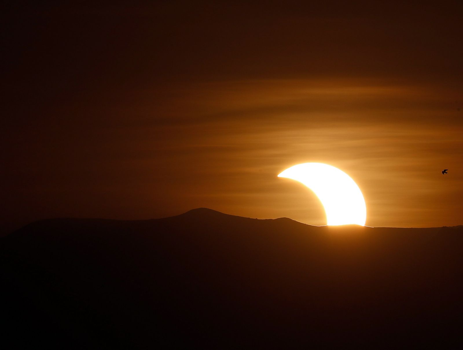 Las imágenes del último eclipse solar de la década