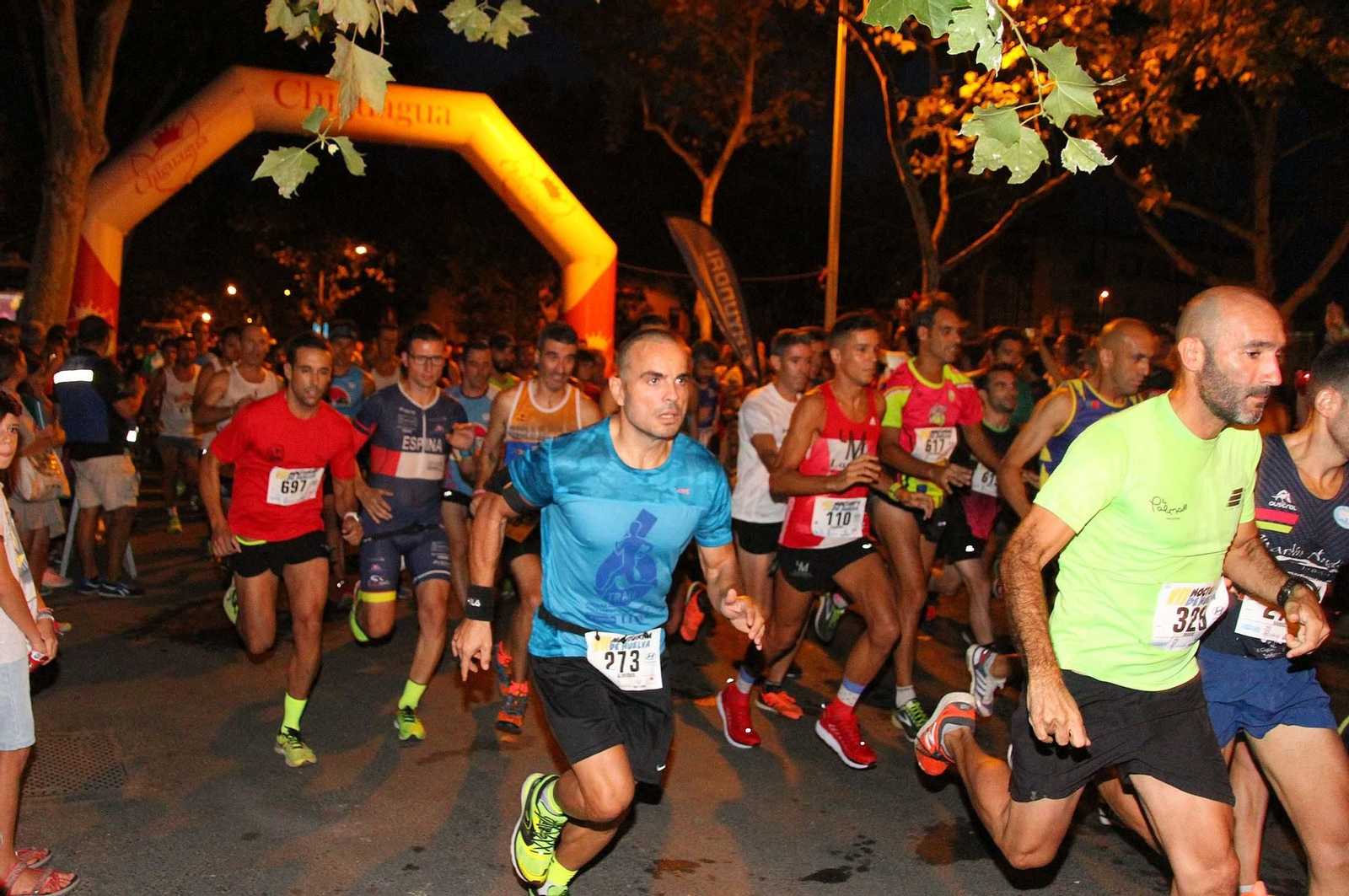La VII Carrera Nocturna de Huelva en imágenes