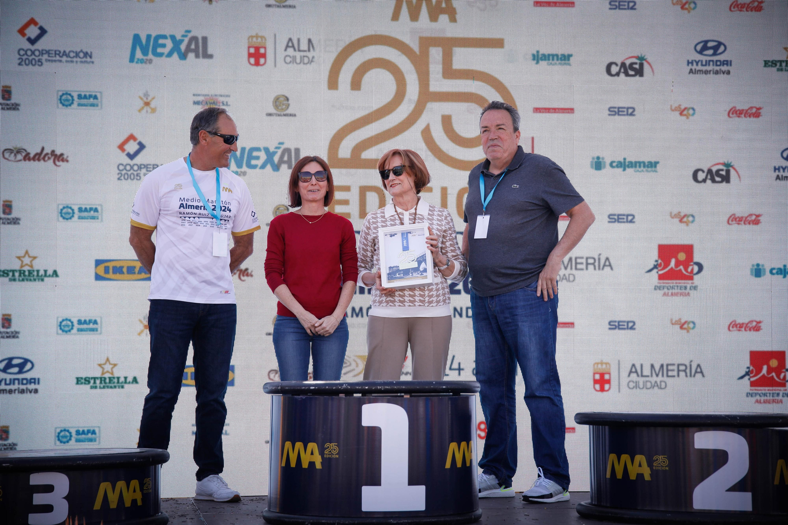 Imágenes de los premiados en la Media maratón de la Cuidad de Almería
