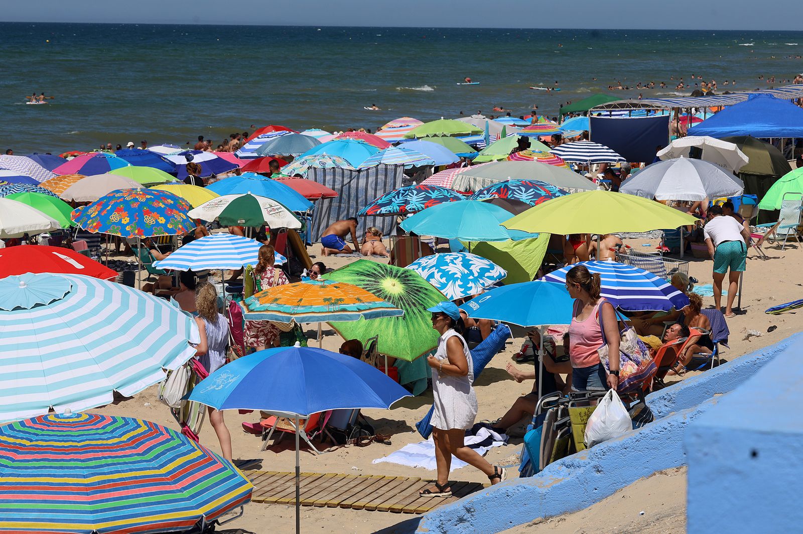 Imágenes de una mañana de calor y playa en Matalascañas