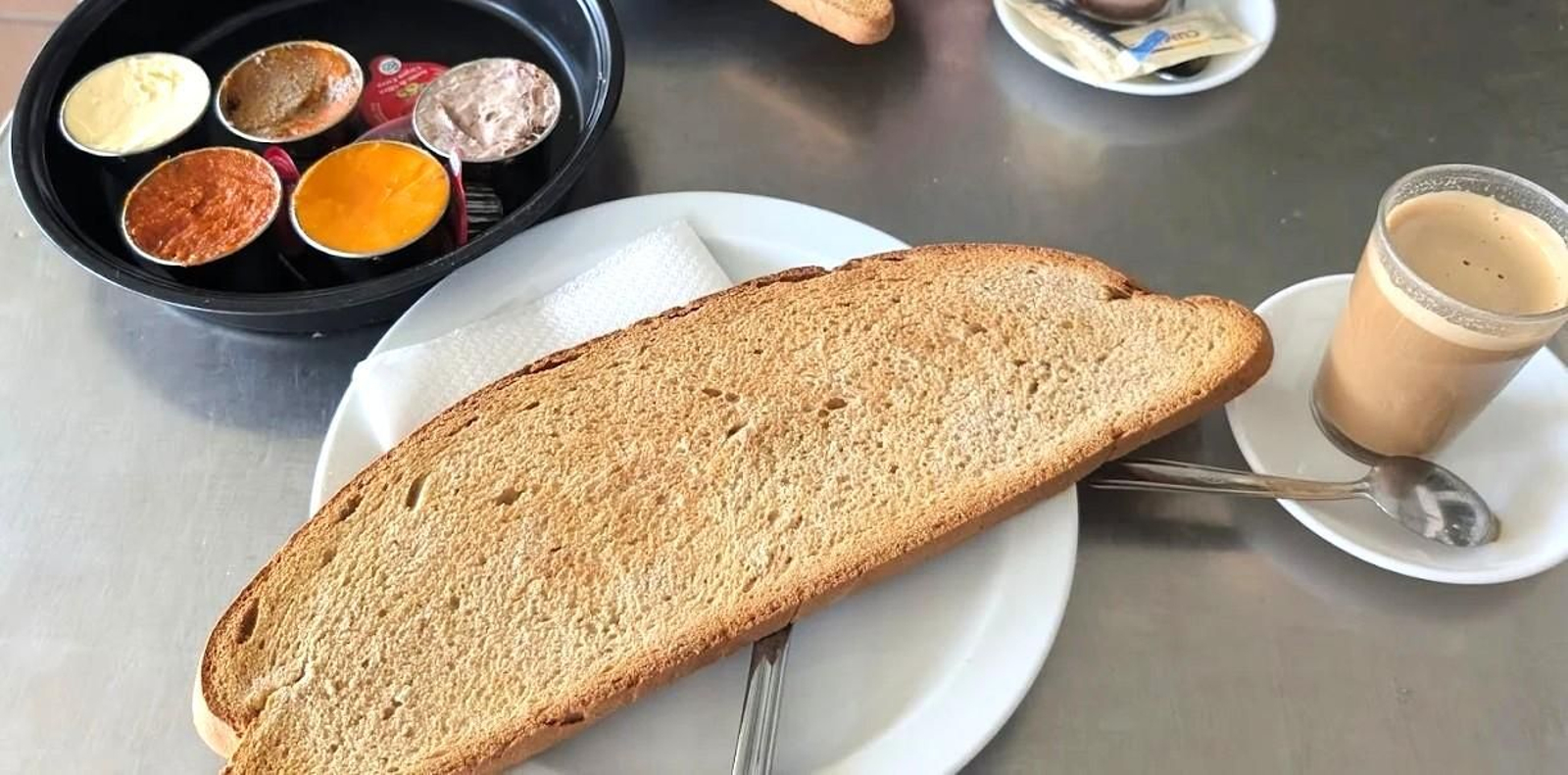 Tostada y mantecas de la Venta Candela