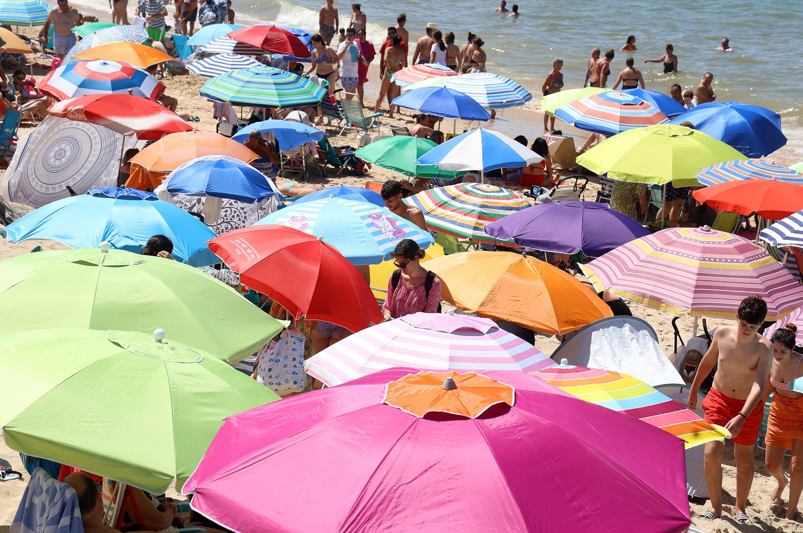 Imágenes de una mañana de calor y playa en Matalascañas