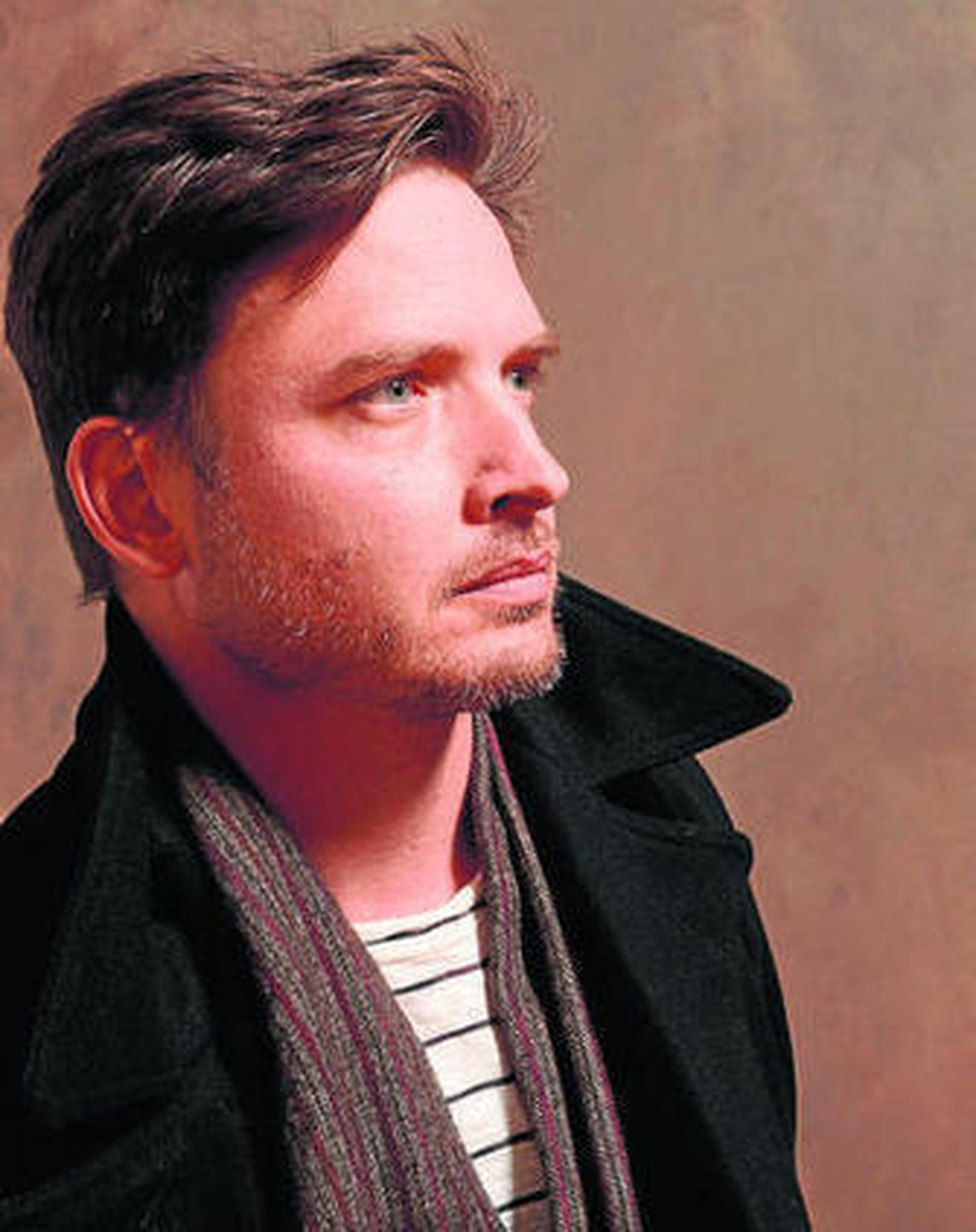 El actor y director canadiense Aden Young.