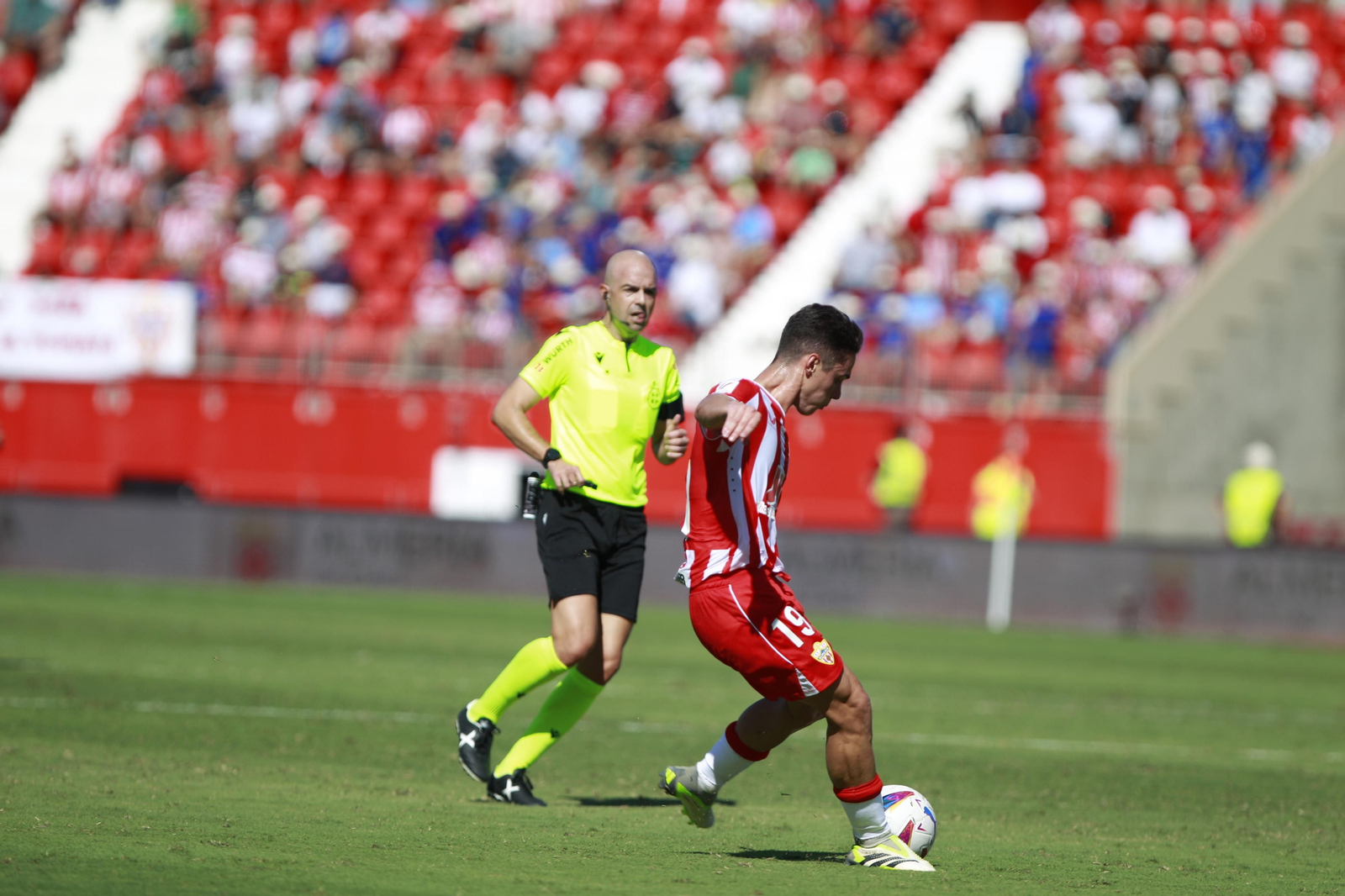 Imágenes del empate a 3 de la U.D. Almería y el Granada C.F.