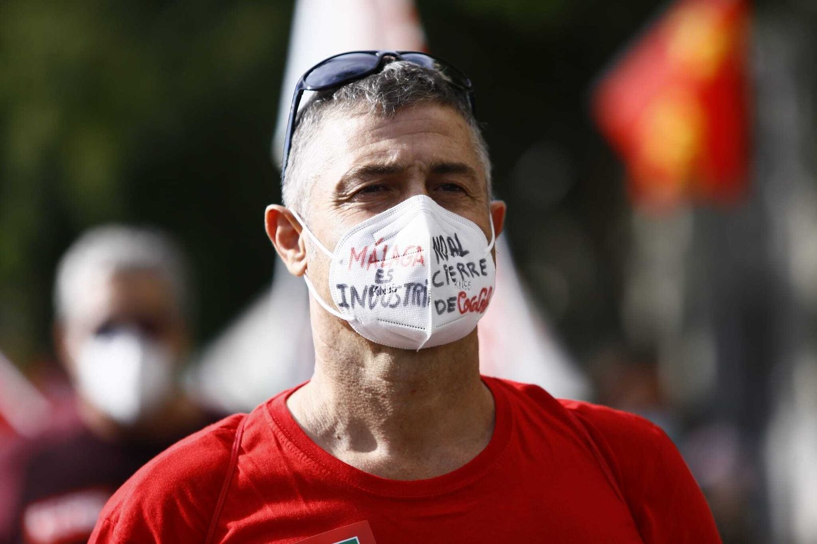 Fotos de la manifestación en Málaga en defensa de la industria local